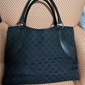 Gucci Black Leather Detail with Logo Pattern